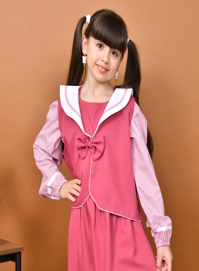 HAWRAA ABAYA Hanin Fuchsia Apron: Elegant design with checkered sleeves and a separate waistband decorated with a bow