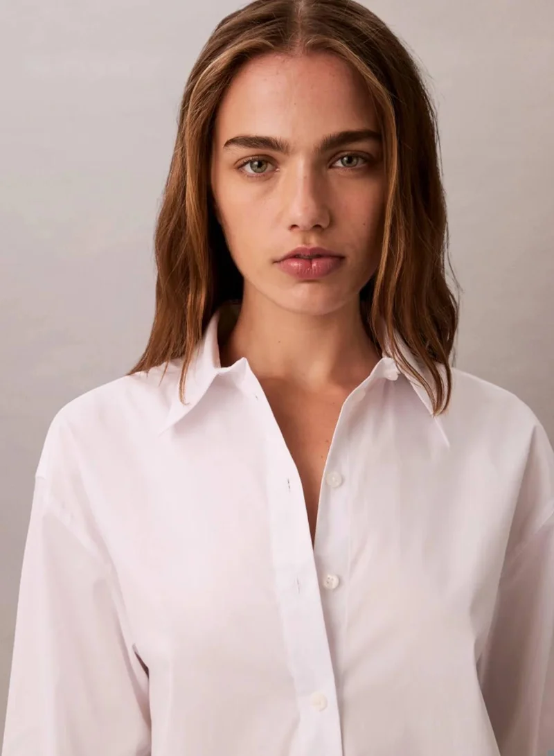 Calvin Klein Brilliant White Relaxed Poplin Stretch Shirt for Women | Best Price UAE
