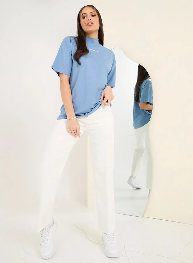 Styli Oversized Embroidered Slogan Longline T-Shirt
