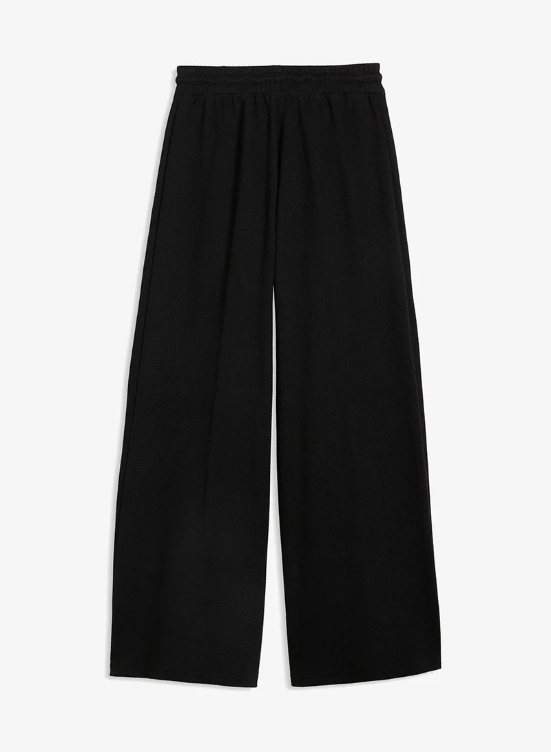 Puma PUMA Black Classics Relaxed Sweatpants for Women | Best Price UAE