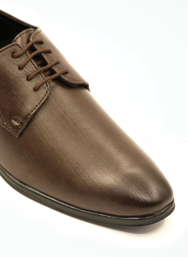 Geoomnii Upgrade your style with these timeless formal lace-up shoes for men. Crafted with a sleek design and polished finish, they are perfect for office wear, business meetings, parties, and special events. The classic lace-up closure ensures a secure fit, while the cushioned insole offers lasting comfort throughout the day. Pair them with suits, formal trousers, or semi-formal outfits to achieve a sharp and sophisticated look.