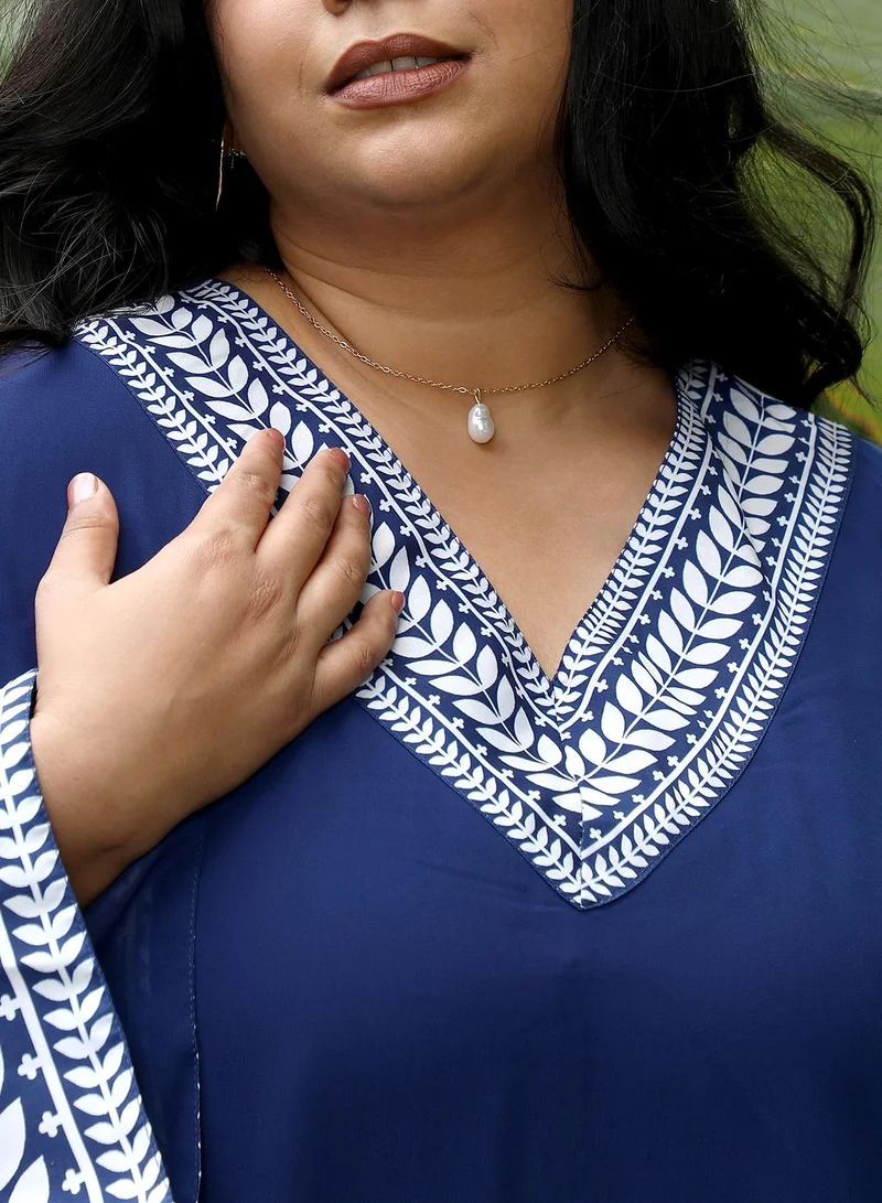 انستافاب بلس Instafab Plus Women's Indigo Blue Indie Leaf-Lined Imprint Kurta Set For Ethnic Wear | V-Neck, Long Flared Sleeves | Floral Placement Print Plain Fabric | 2 Piece Kurta Set For Casual & Evening Wear