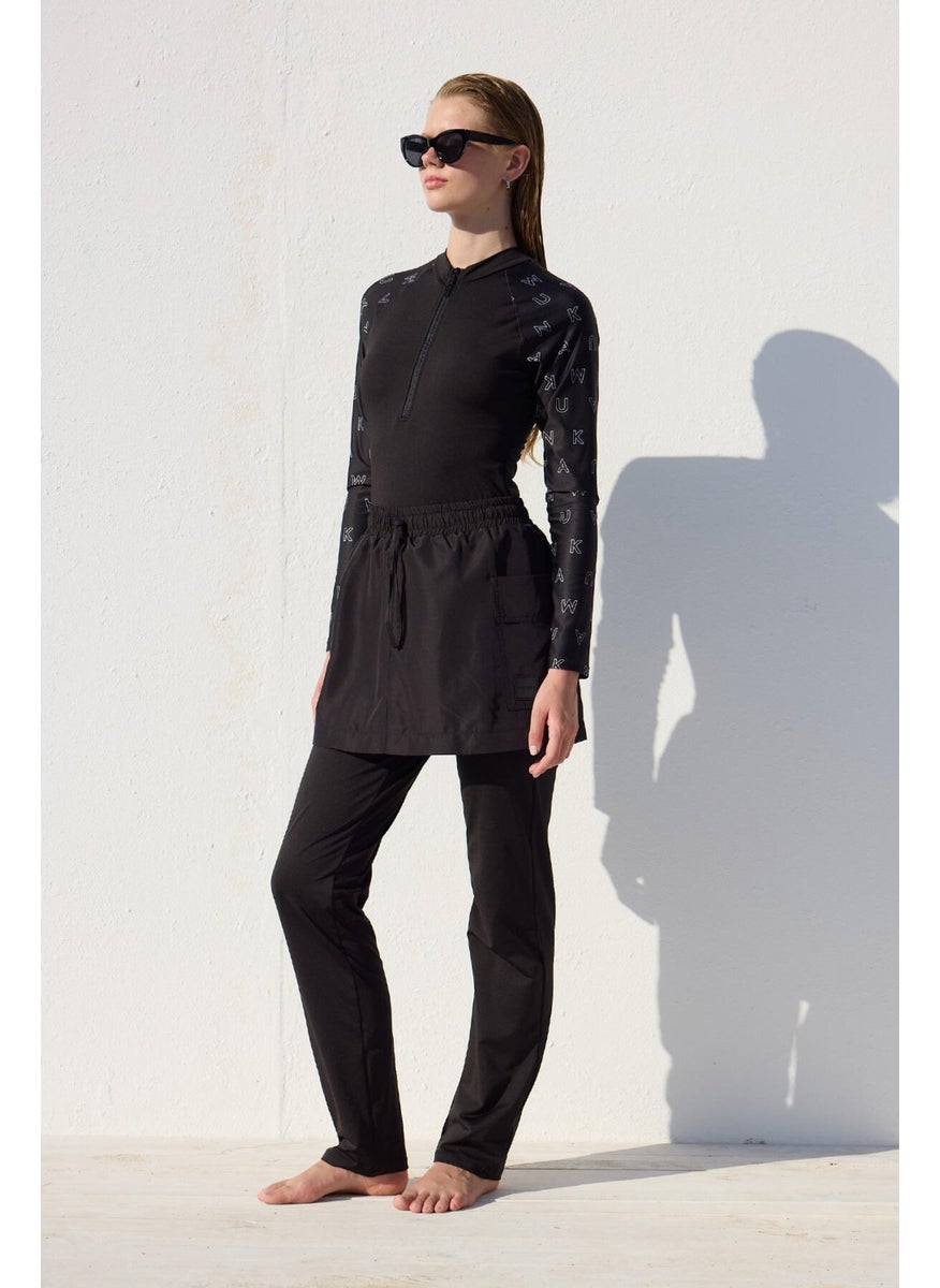 Manuka - Trouser Skirt Swimsuit Black - Image 1