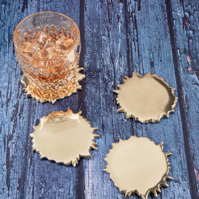 GIBOX Designer Gold Spilled Matt Finish Fancy Metal Anti Slip Tea Coaster (Set of 4) for Kitchen Home & Bar Accessories Home Decor Dinning Gifts Restaurants Living Rooms, Coffee Table - Image 1