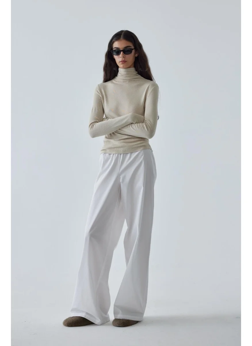 سود كوليكشن Beige Mia Turtleneck Bodysuit