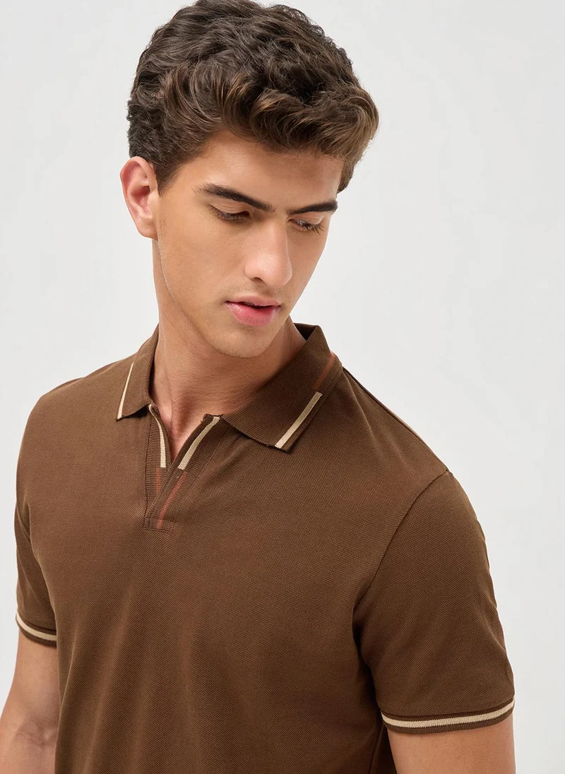 Urbano Fashion  Urbano Fashion Men's Dark Brown Solid Regular Fit Half Sleeve Cotton Polo T-Shirt for Men | Best Price UAE