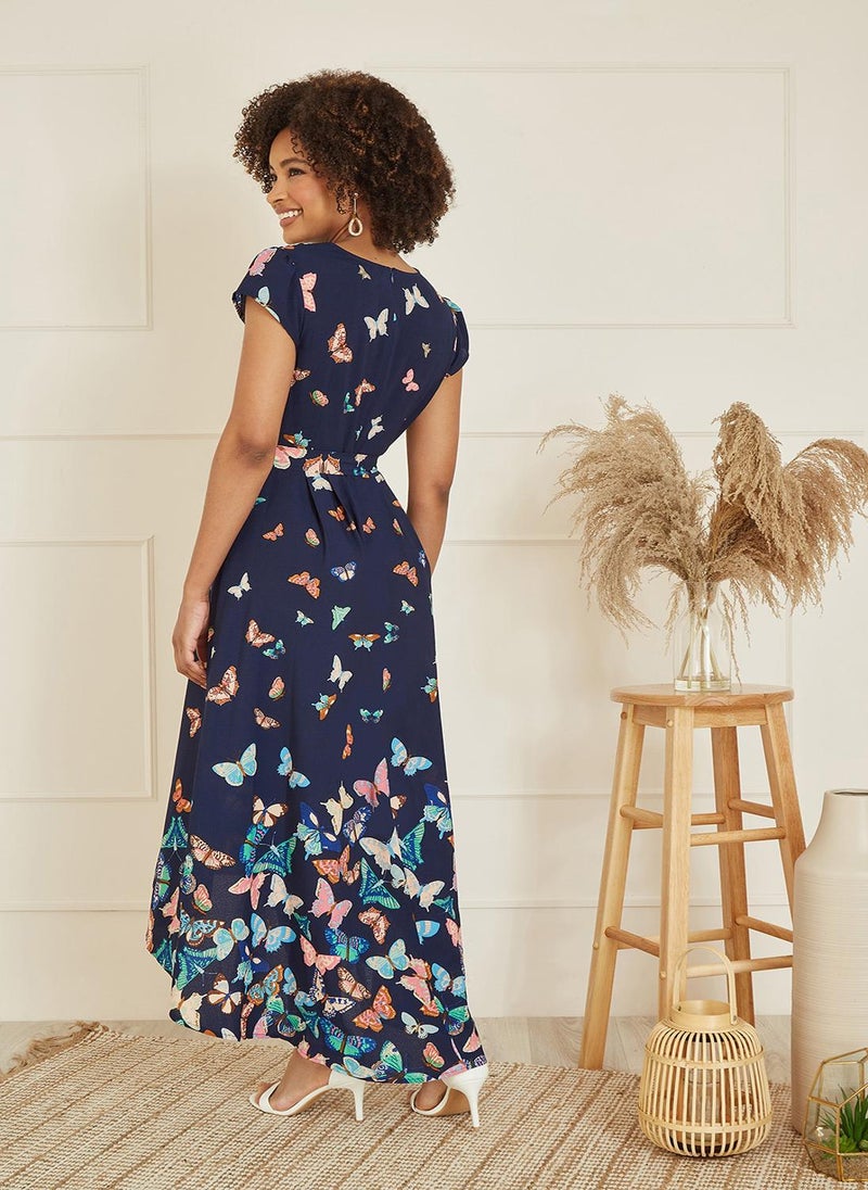 Yumi - Yumi Navy Butterfly Print Dip Hem Midi Wrap Dress - Image 1