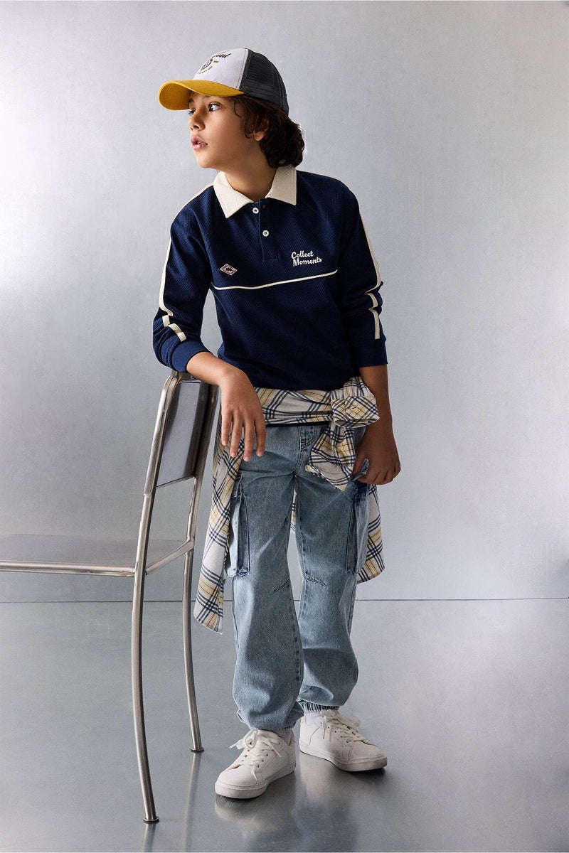 ديفاكتو تيشيرت بولو اولادي كم طويل اوفر سايز - Image 2