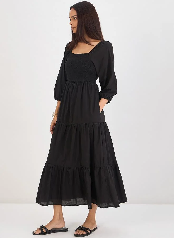 Femmella Women Black Cotton Smocked Tiered Maxi Dress