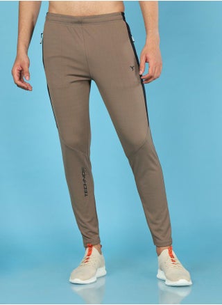 Men Solid Slim Fit Track Pants with TECHNO DRY - pzsku/ZA1CA804B03F54A7AB4BBZ/45/1745319492/476eadac-0123-43c8-a68a-1732425bcd57