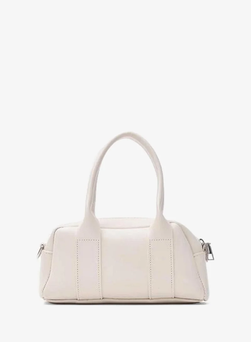 Left Cream Hand and Crossbody Bag.