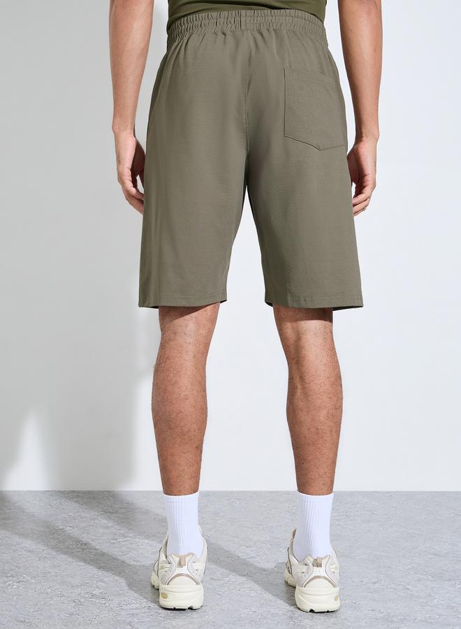 Styli Olive Solid Pocket Detail Active Shorts - Image 4