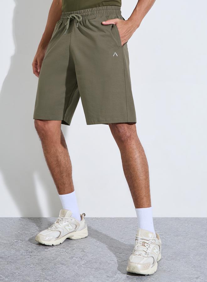 Styli Olive Solid Pocket Detail Active Shorts - Image 1