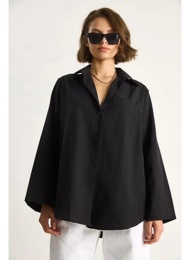 جينجر قميص بأزرار كبير الحجم