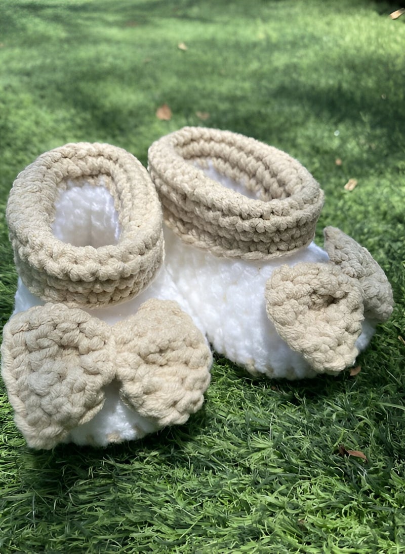 Braidise Creations Braided Baby Booties White and brown with bow 4 inch sole for new born, 2 to 6 months baby feet - Image 1