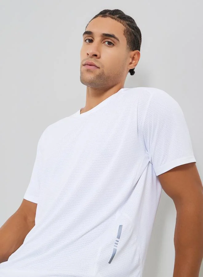 ستايلي اكتيف تيشيرت رياضي بقصة عادية سريع الجفاف بنسيج مميز