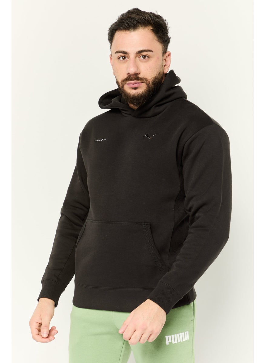 PUMA Puma x Sorayama Men Relaxed Fit Long Sleeves Outdoors Hooded Sweatshirts, Black  - Image 1