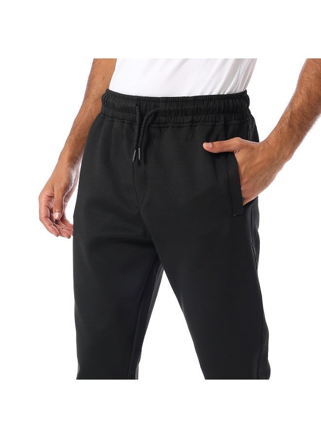 Caesar Men's athletic-style trousers with side pockets. - Image 4