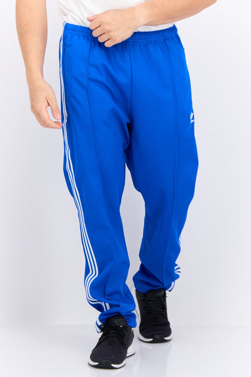 Adidas Men Sportswear Fit Wide Leg Training Sweatpants, Blue - Image 1