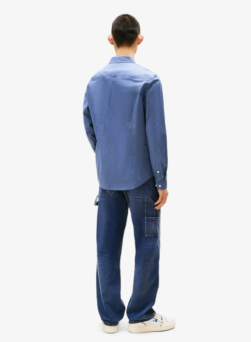 تومي جينز قميص كاجوال بقصة عادية مطاطي