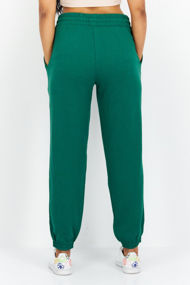 PUMA Women Sportswear Fit Brand Logo Training  Pants, Green - Image 4