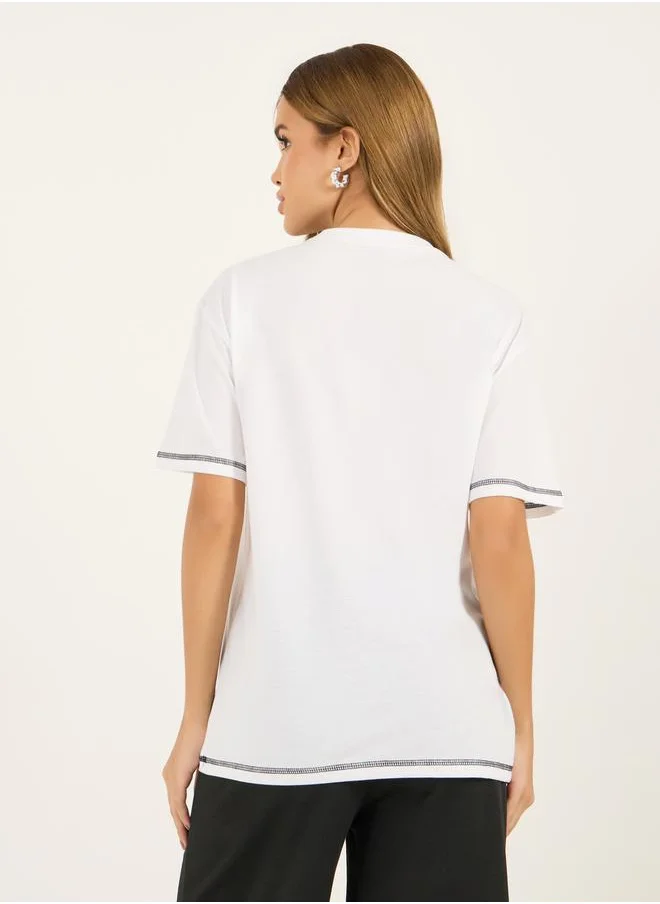 Styli Contrast Stitch Oversized T-Shirt with Badge Slogan Print Detail