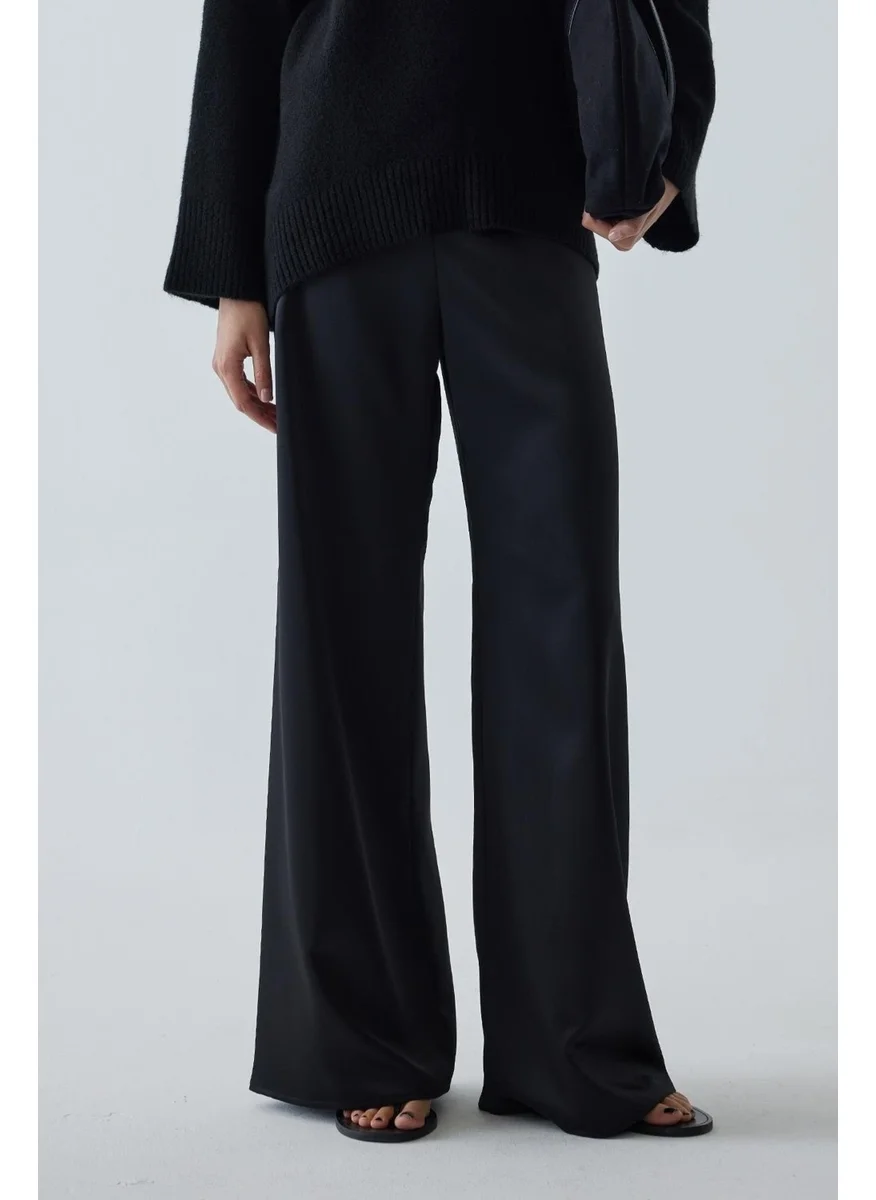 سود كوليكشن Saud Collection Black Pol Satin Trousers
