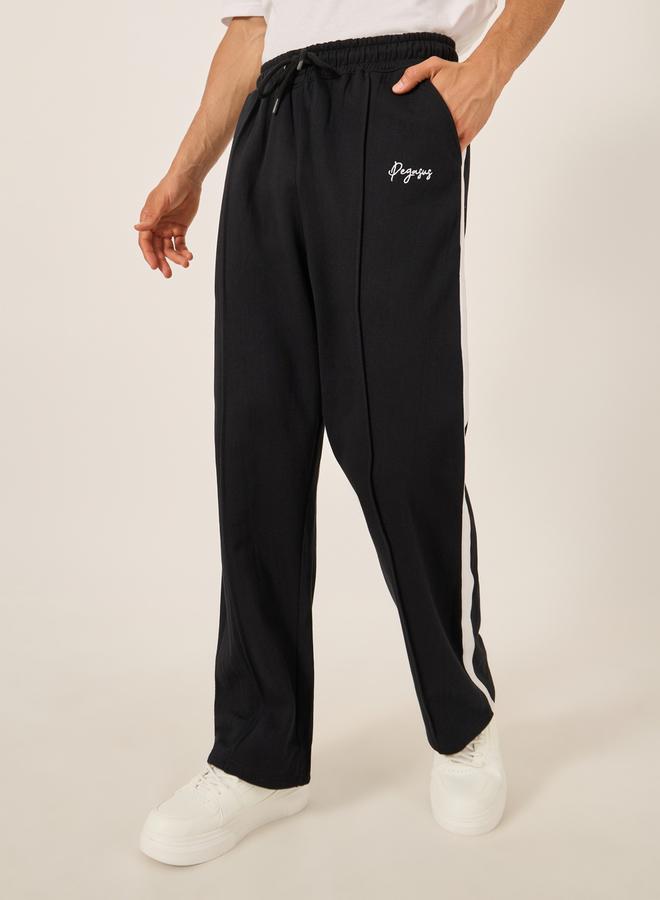 Styli Oversized Wide Tuck Fleece Joggers with Side Stripe and Print Detail - Image 1