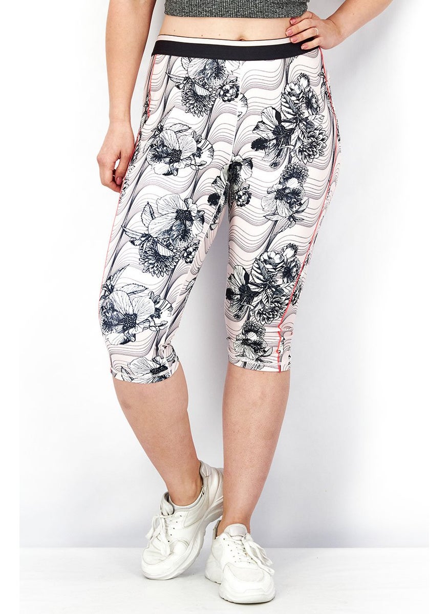Tchibo Women Sportswear Fit 3 and 4 Cropped Floral Tights, Pink and Black  - Image 1