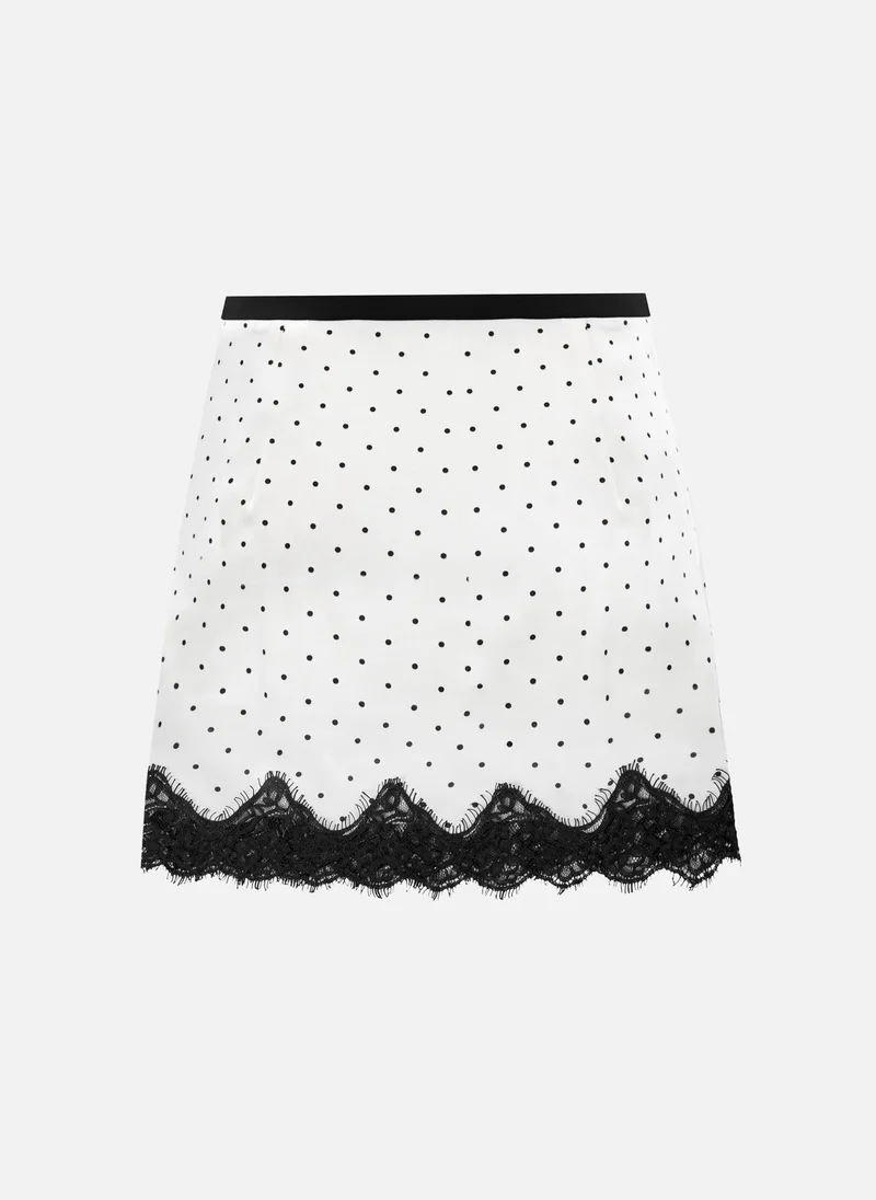 Lichi  Polka dot mini skirt with lace trim for Women | Best Price UAE