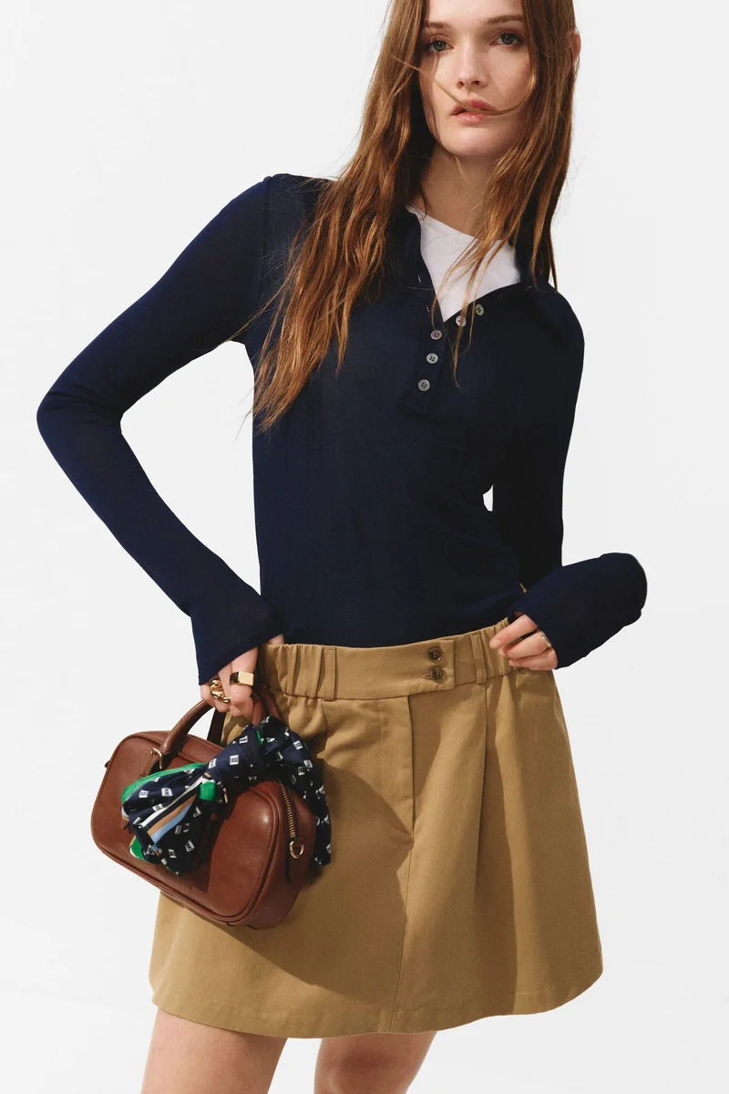 اتش اند ام تنورة ميني بحافة واسعة