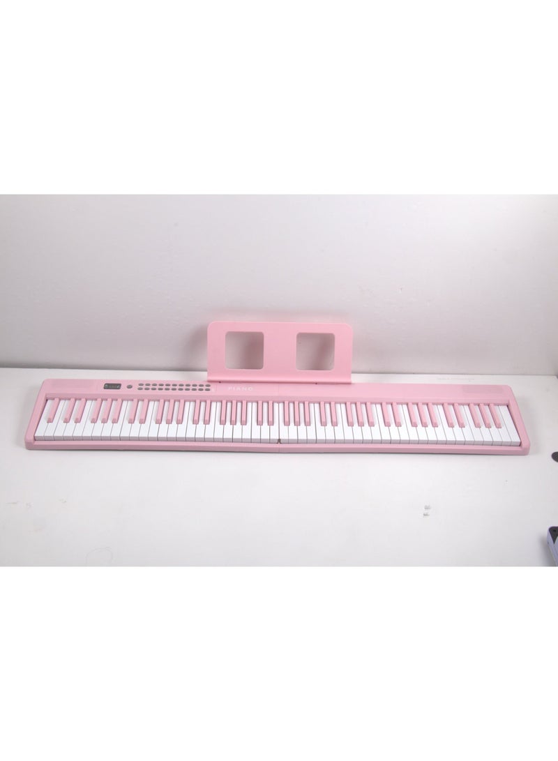 والالا بيانو إلكتروني قابل للطي بـ 88 مفتاحًا، مزود بلوحة مفاتيح من النوع C، بجهد 5 فولت، وشاشة LED ثلاثية الأرقام، مع وضع بلوتوث مزدوج، و1000 إيقاع، و1000 نغمة، و150 عرضًا تجريبيًا للمبتدئين والبالغين (لون وردي، وزن 4.4 كجم). - Image 3