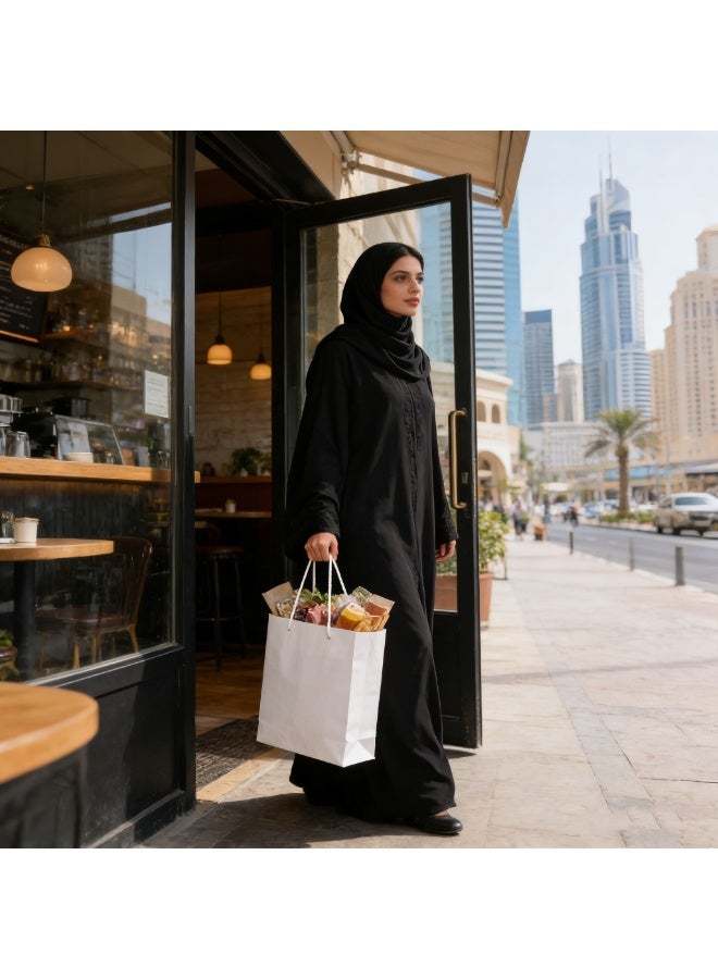 12 حزمة من الأكياس ذات المقابض المصنوعة من الورق المقوى الأسود والأبيض 28×20×10 سم أكياس هدايا سميكة صديقة للبيئة لحفلات الزفاف وأعياد الميلاد والحفلات - Image 2