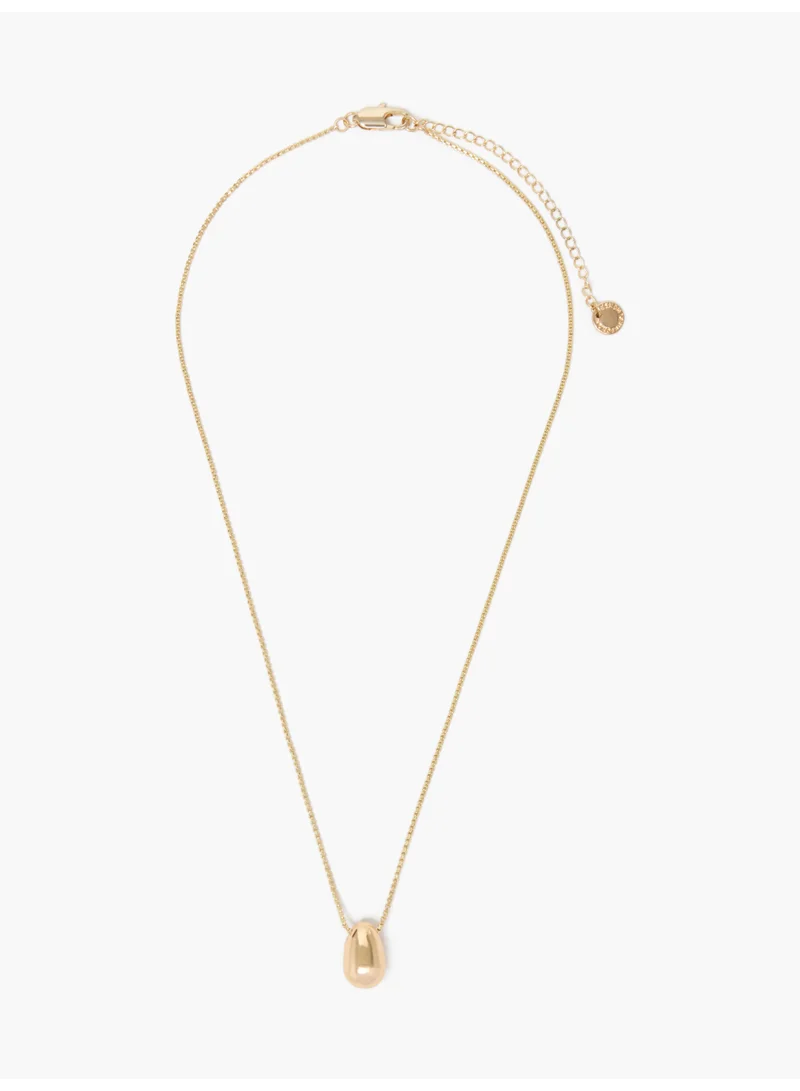 French Connection UK Sculptural Bean Pendant Necklace