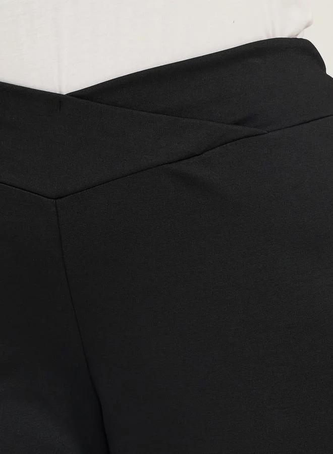 Styli Plus Size Criss-Cross Waistband High Rise Flared Pants