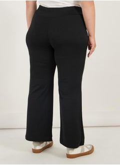 Styli Plus Size Criss-Cross Waistband High Rise Flared Pants  - Image 4