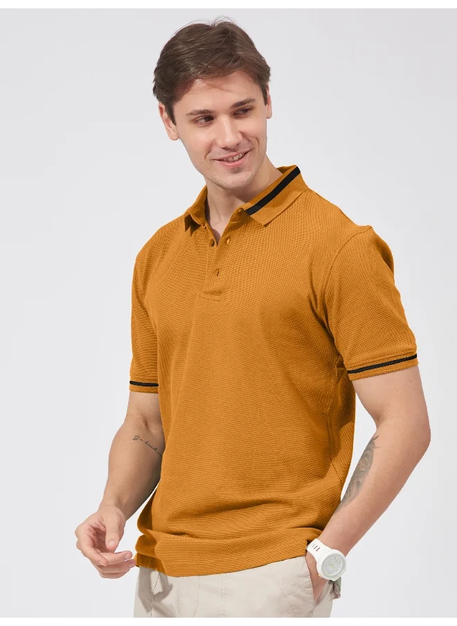 مانياك Mens Solid Polo Neck Half Sleeve Mustard Slim Fit T-Shirt