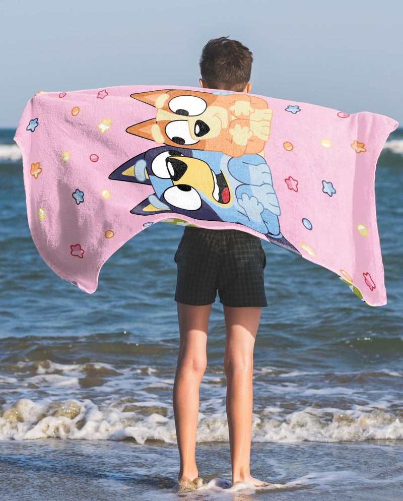 Jay Franco Bluey & Bingo Beach Towel - Pink Kids Super Soft & Absorbent 100% Cotton Towel for Bath and Pool, Measures 28 x 59 - Image 1