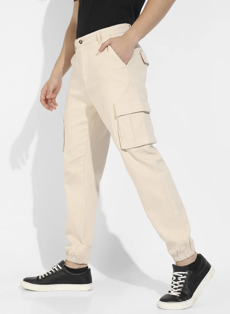 Campus Sutra  Men's Beige Cuffed Hem Cargo Trousers for Men | Best Price UAE
