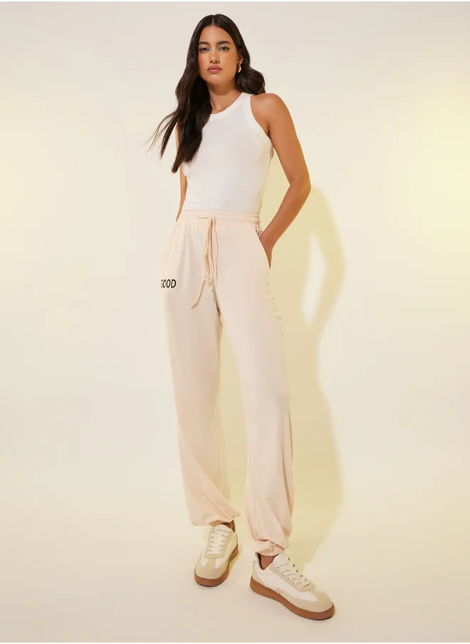 Styli Typography Print Drawstring Waist Wide Leg Joggers