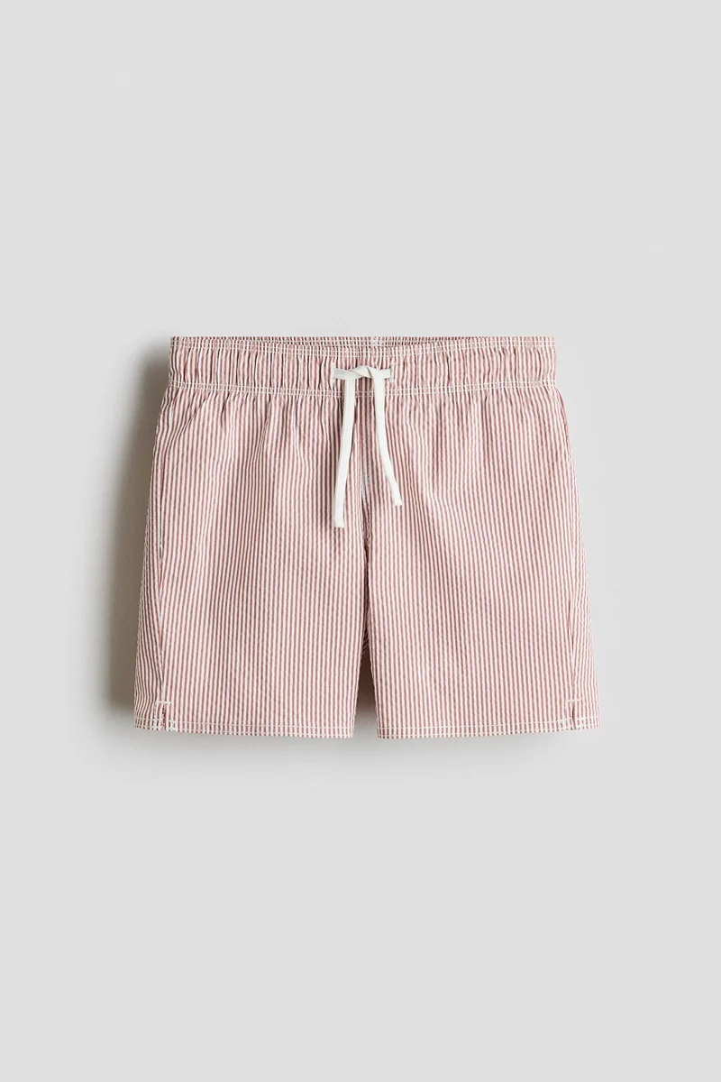 اتش اند ام شورت سباحة مزين بنقوش