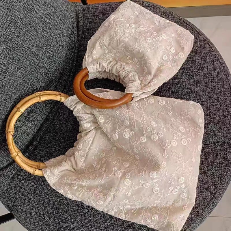 حقيبة دلو صغيرة من القماش مع تطريز زهري - Image 2
