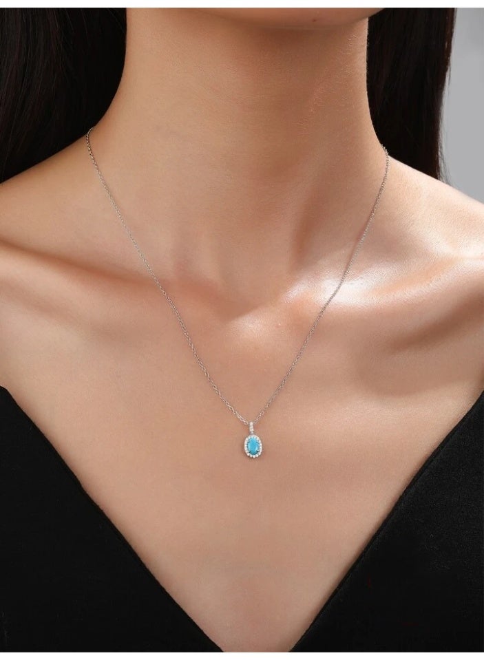 925 ستيرلنغ سيلفر تشارمز سلسال بقلادة فاخرة ناعمة مصنوعة من الفضة الإسترلينية عيار 925 بجودة عالية ودقة شديدة مزينة بحجر الأوريون الفيروزي محاط بكريستالات ناعمة طبيعية من حجر الزيركون لتعطي مظهرا رائعا للأميرة التي تستحقها - Image 1