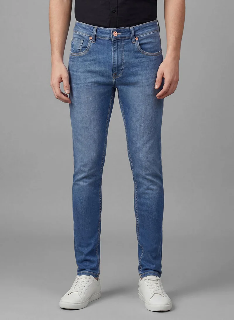 بيينغ هيومان Men Slim Fit Mid-Rise Light Fade Jeans