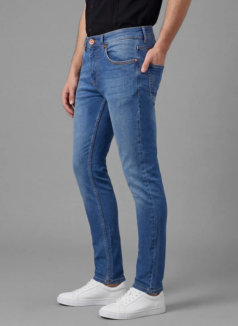 بيينغ هيومان Men Slim Fit Mid-Rise Light Fade Jeans