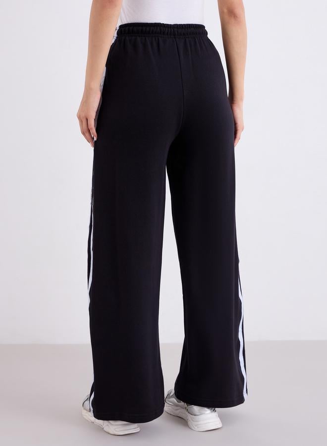 ستايلي جوغر بأرجل واسعة وتفاصيل درزات جانبية - Image 5