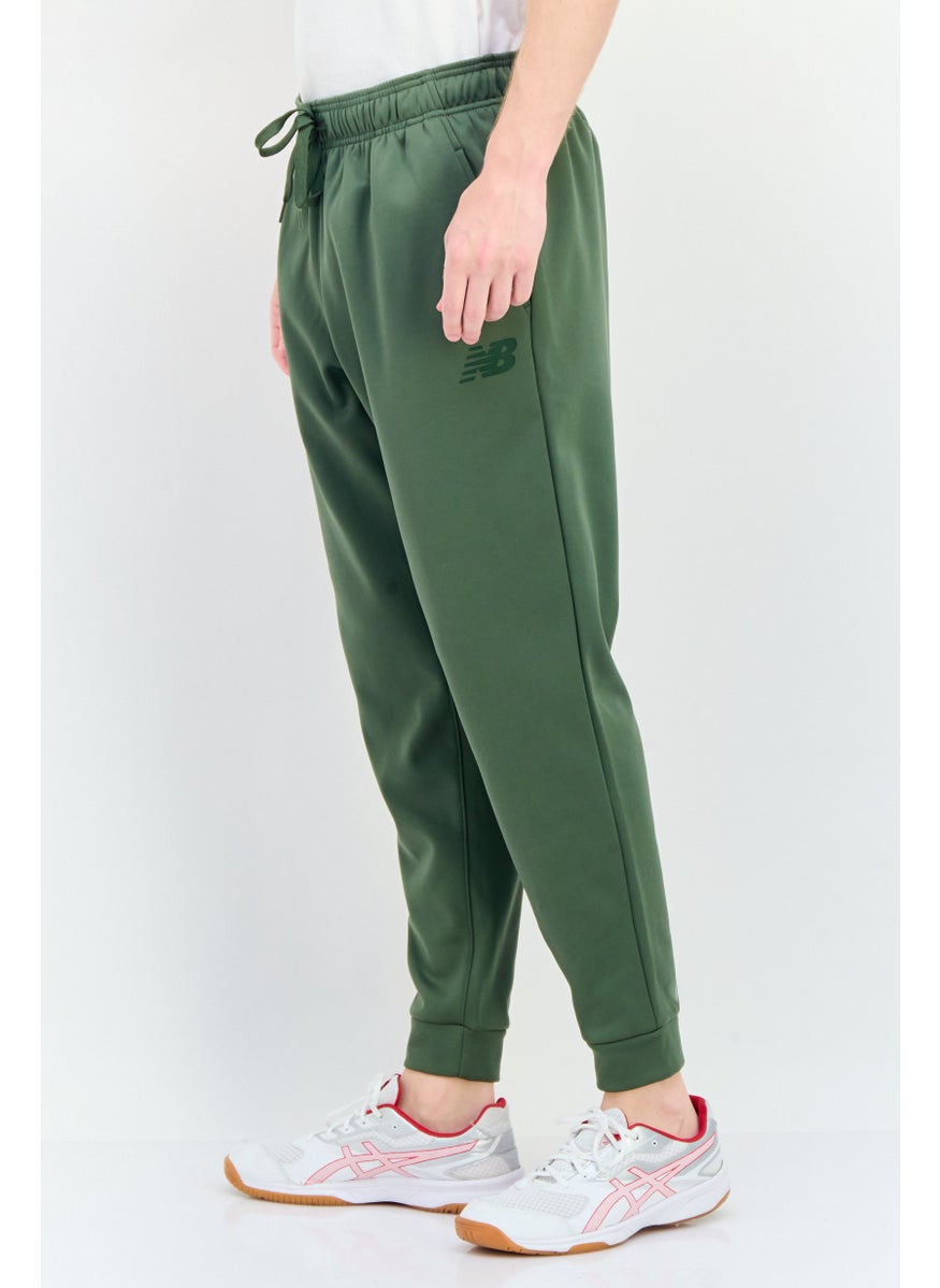 New Balance Men Athletic Fit Outdoor Sweatpants, Olive  - Image 4