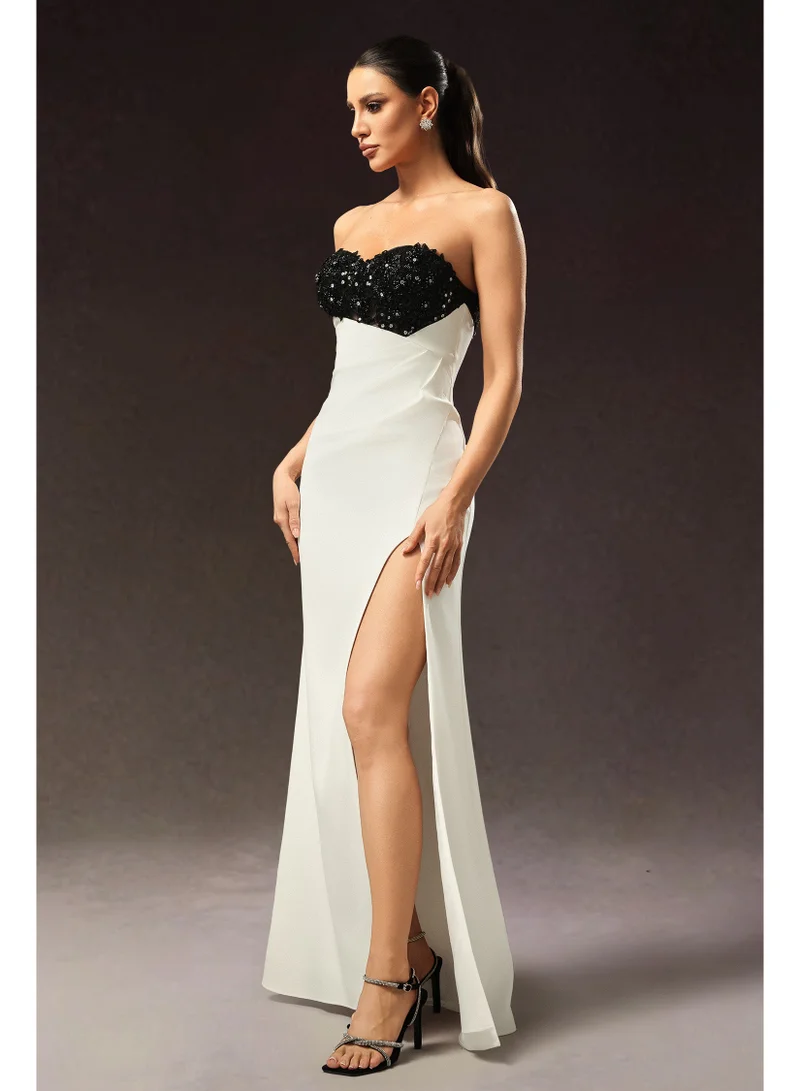 بيلا بارنيت فستان أوليفيا ماكسي بدون أكمام بتصميم زهرة ماسية وفتحة جانبية