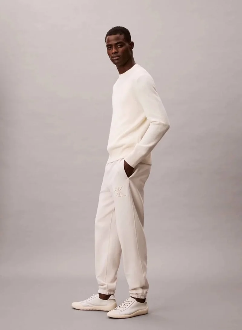 Calvin Klein Jeans Chalk Fleece Monogram Logo Patch Joggers for Men | Best Price UAE