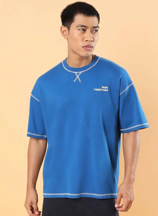 كالت تيشيرت فضفاض بطبعة كتابة